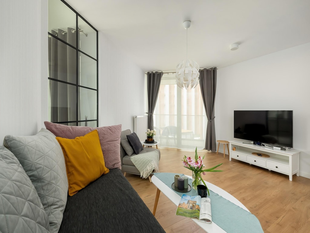 Appartement vlakbij zee, met zwembad en sauna.