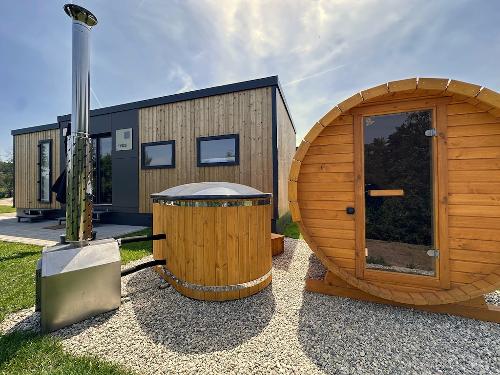 Premium tinyhouse Seeblick met sauna en bubbelbad