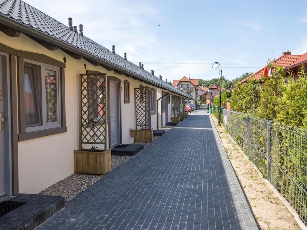 Gemütliche Ferienhäuser aus Holz mit Terrassen