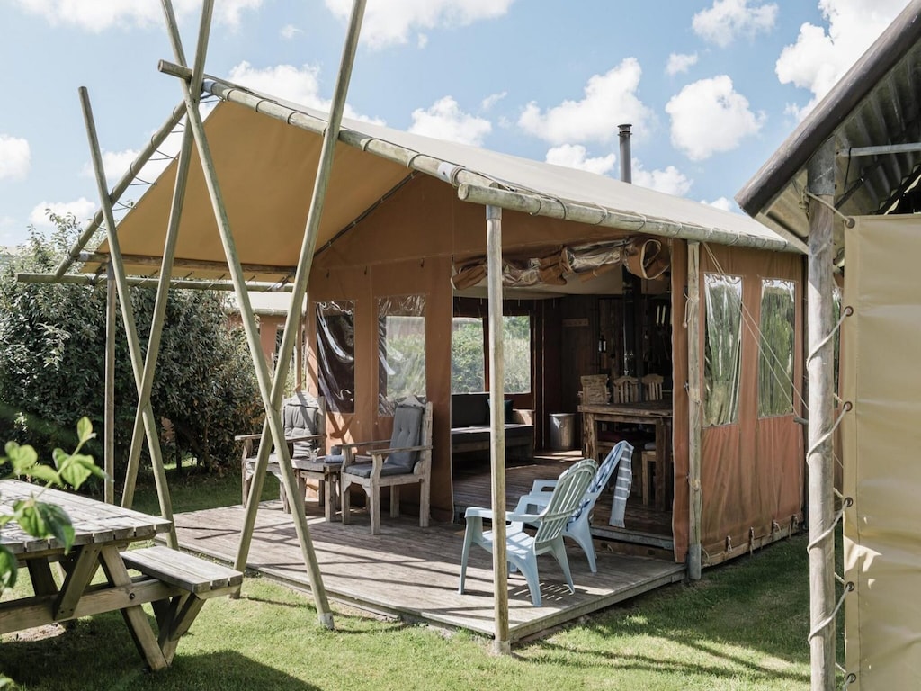 Tent house near dune by Belvilla