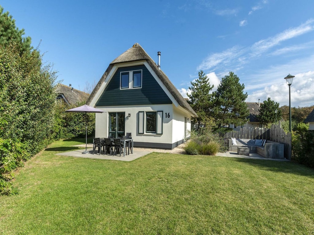 Villa aan het strand met tuin