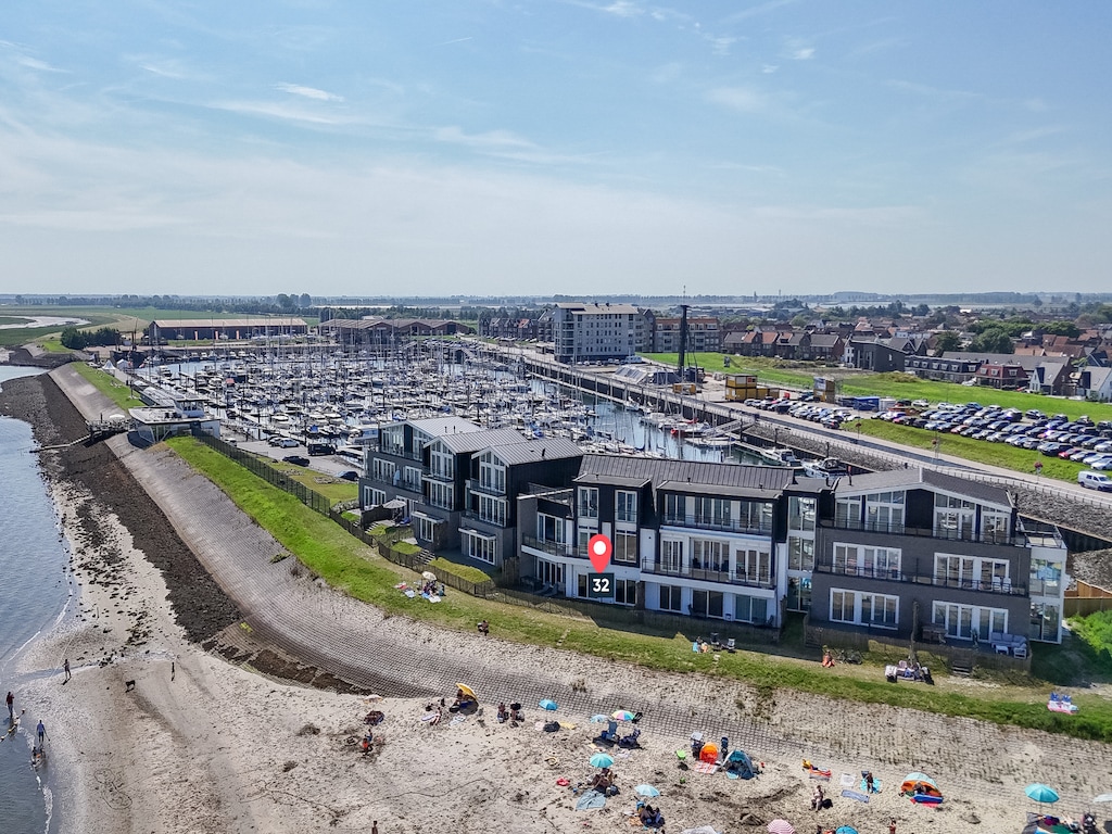 Aangenaam strandhuis met balkon/terras