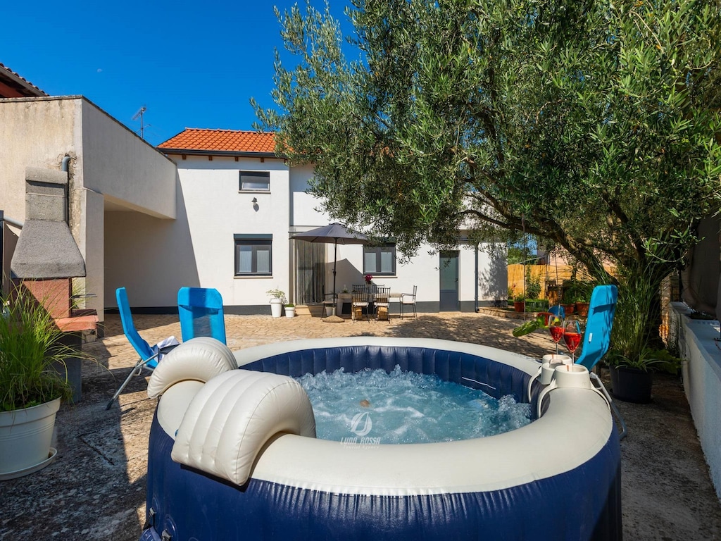 Schattig huis met privétuin en bubbelbad