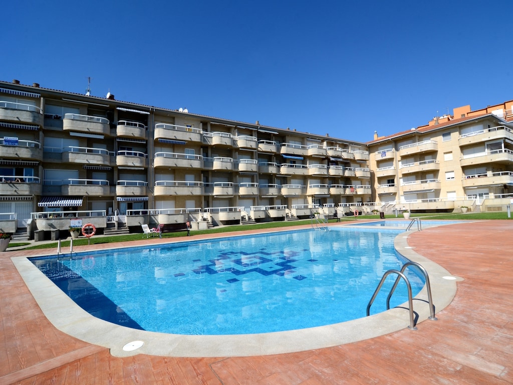 Strandappartement in Griells met Zwembad