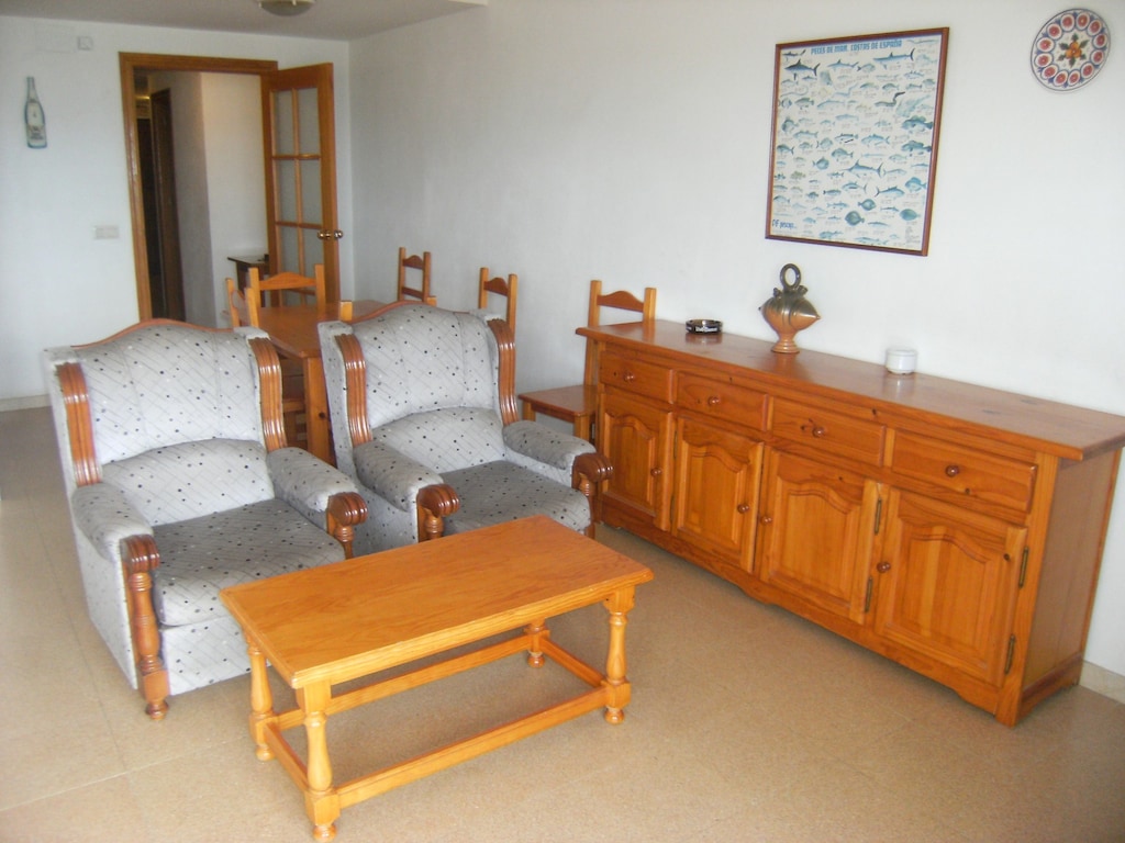 Strandappartement in Spanje met havenzicht