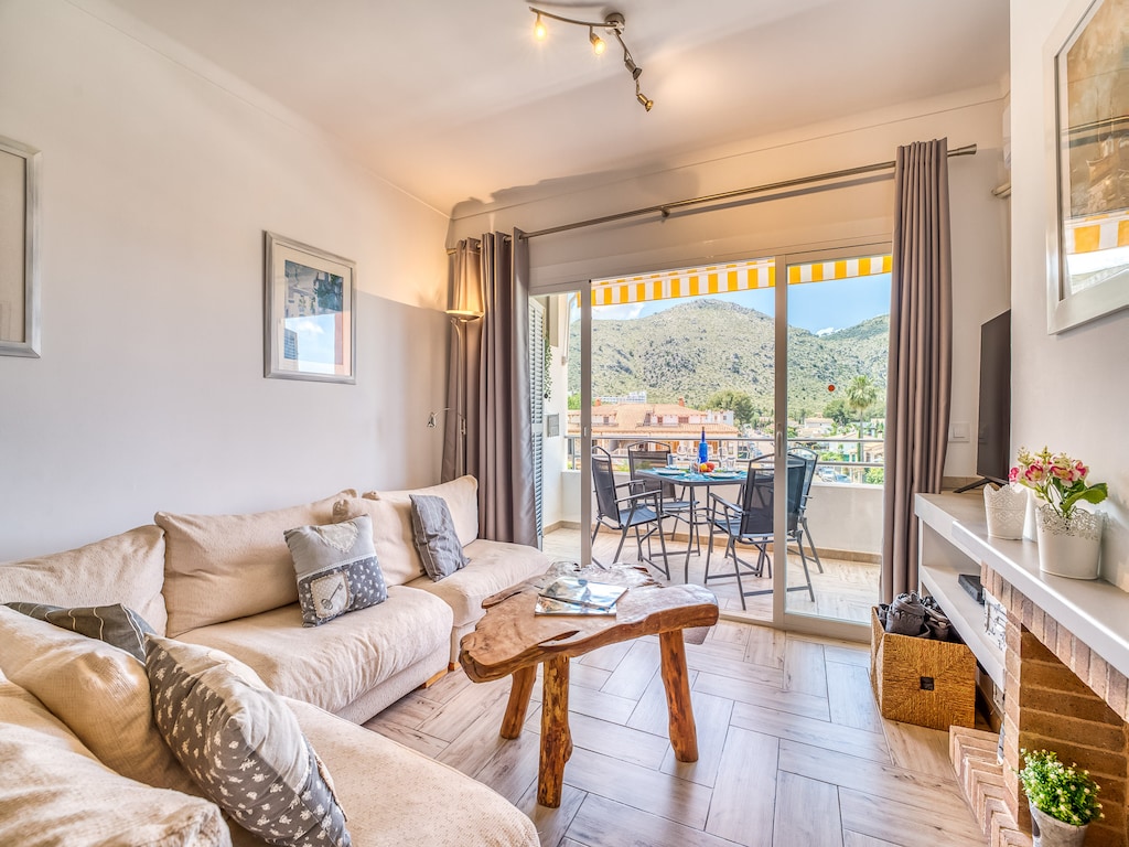 Appartement met uitzicht op de bergen en het meer