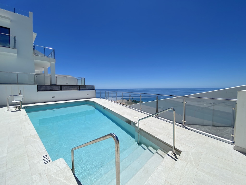 Duplex in Málaga met Zeezicht & Zwembad