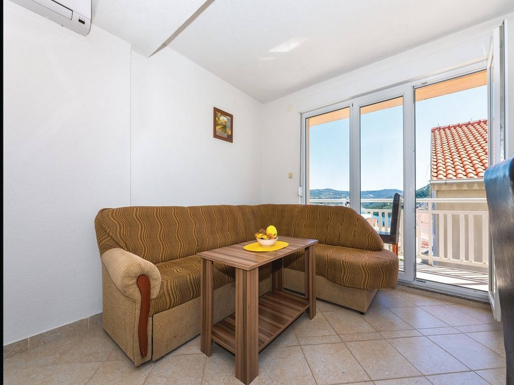 Appartement vlakbij het serene Ponga-strand