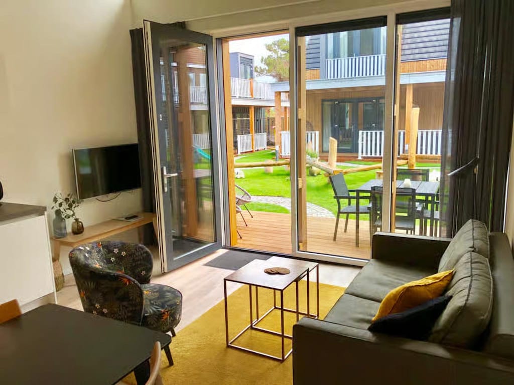 4-persoons lodge in tiny house stijl.