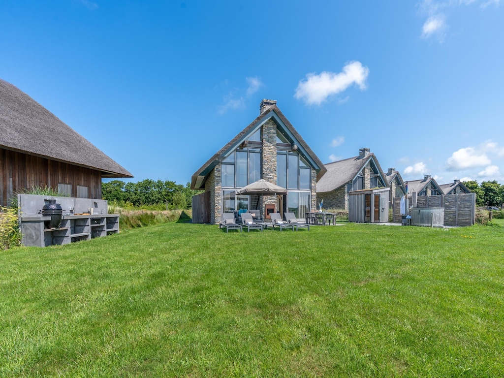 Stilvolle Villa für 6 Personen in De Koog, mit holzbefeuertem Whirlpool, unweit von Strand und Wald.