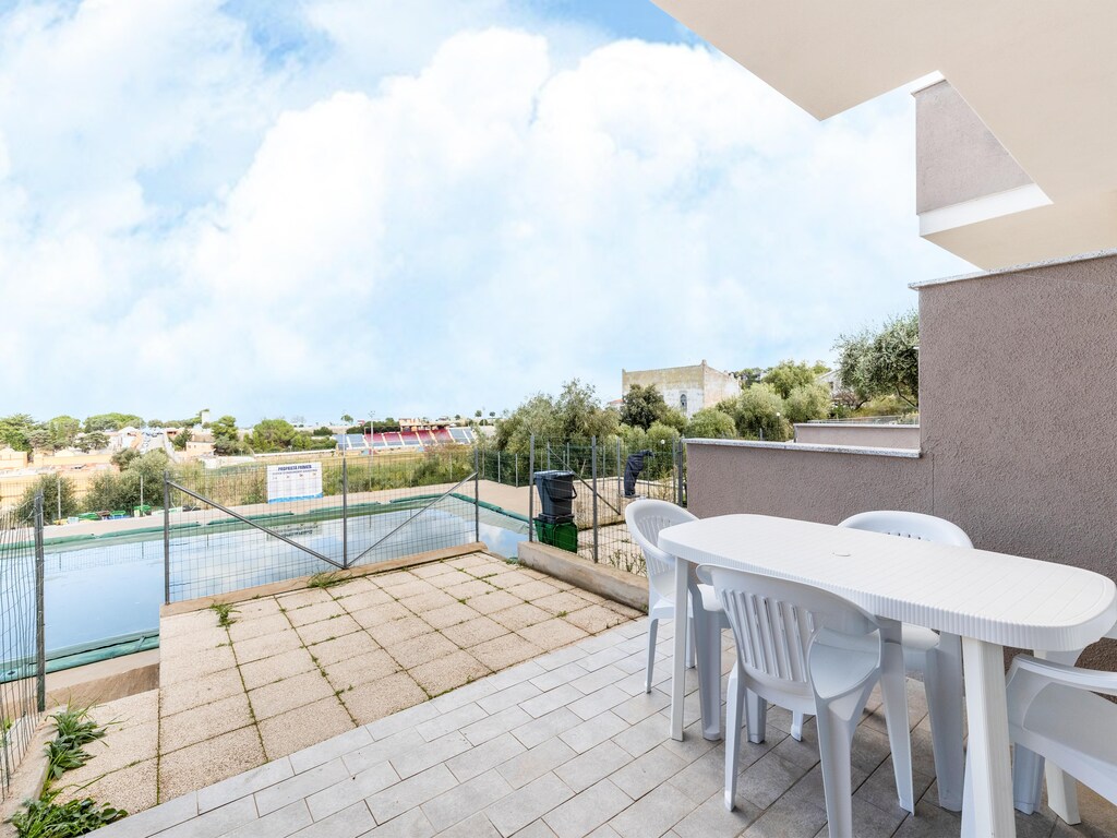 Airconditioning, in een residentie met zwembad en terras.