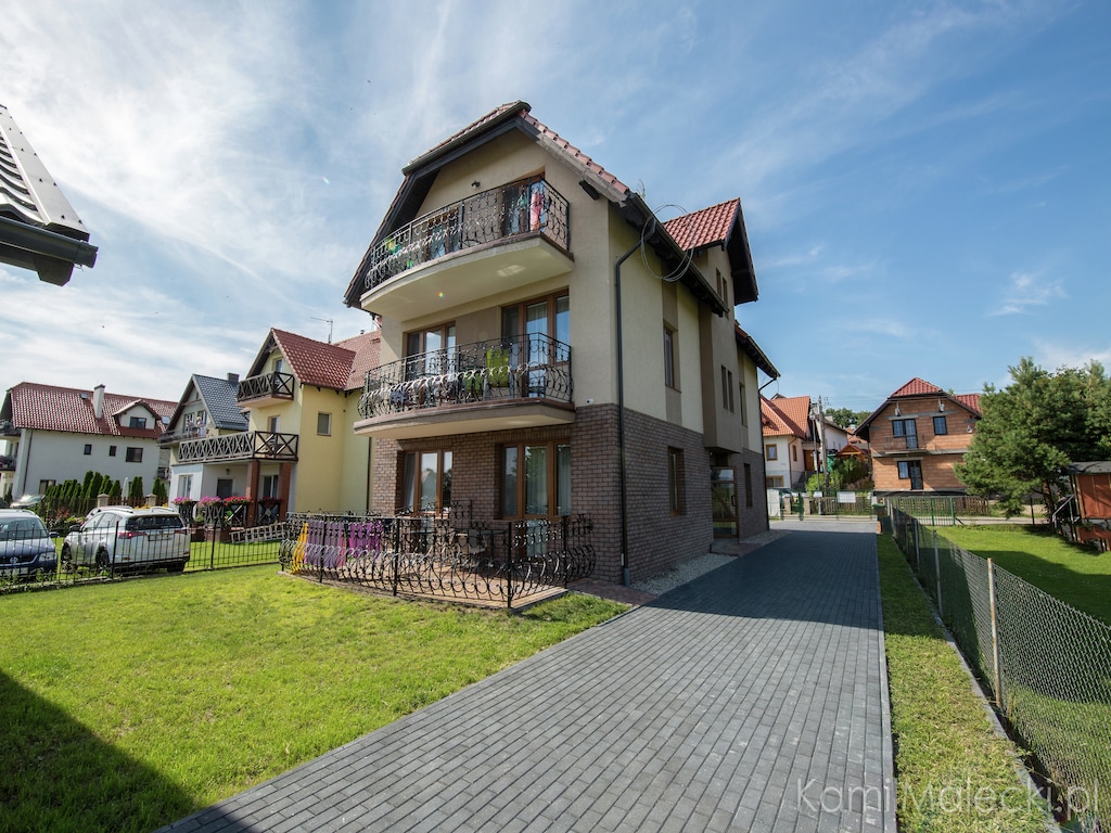 Appartement met balkon, tuin met barbecue