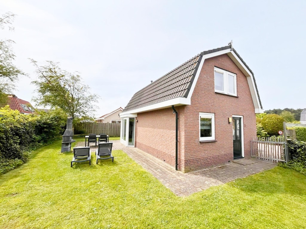 Ruhiger Bungalow für 4 Personen in Noordwijk, haustierfreies Ferienhaus mit Garten und Strand in kurzer Reichweite.
