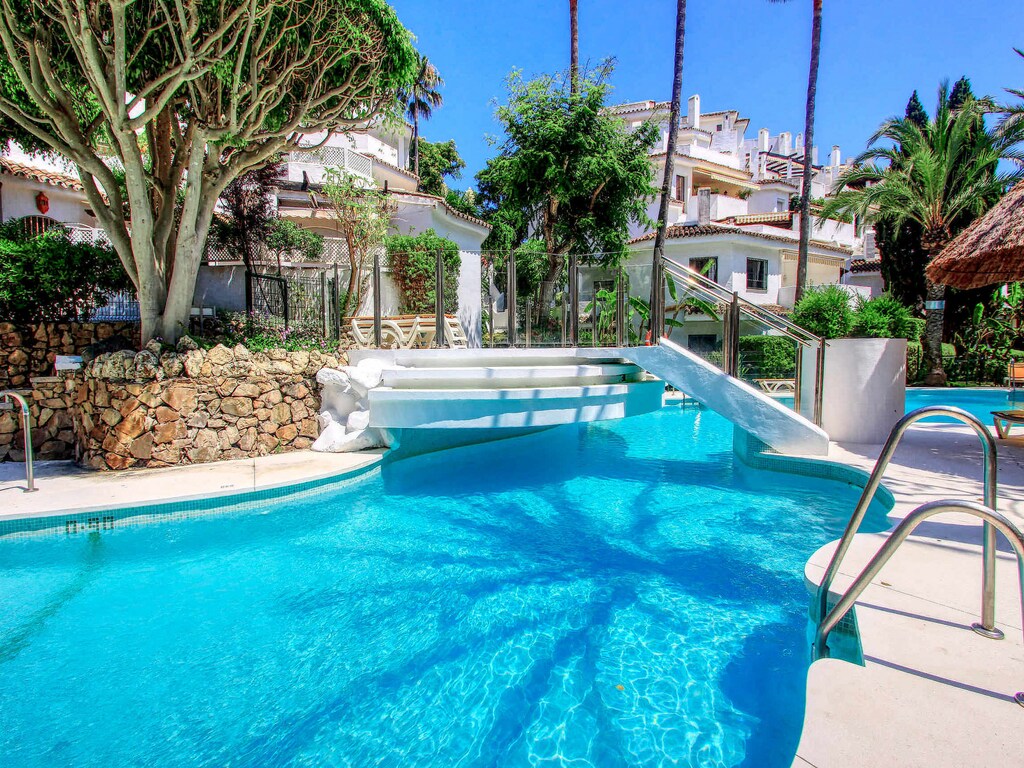 Appartement aan het strand met jacuzzi en zwembad