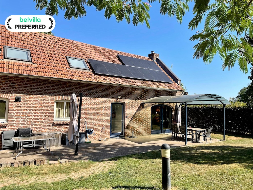 Koetshuis bij Roermond met tuin