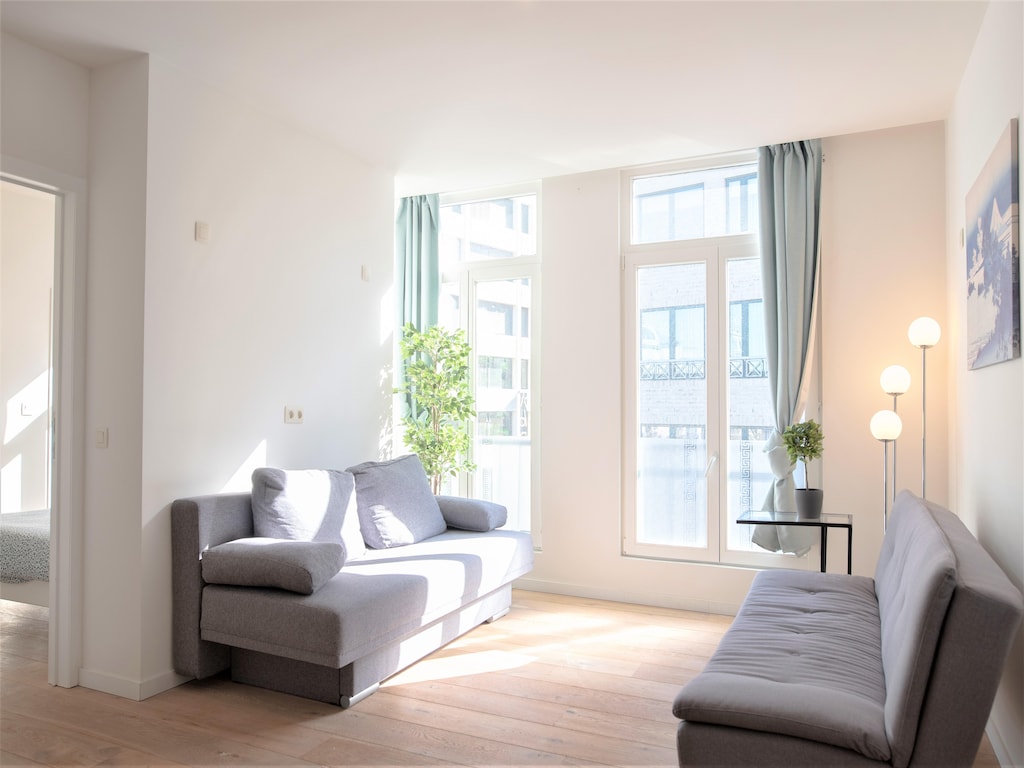 Appartement voor 12 gasten aan het centrale plein