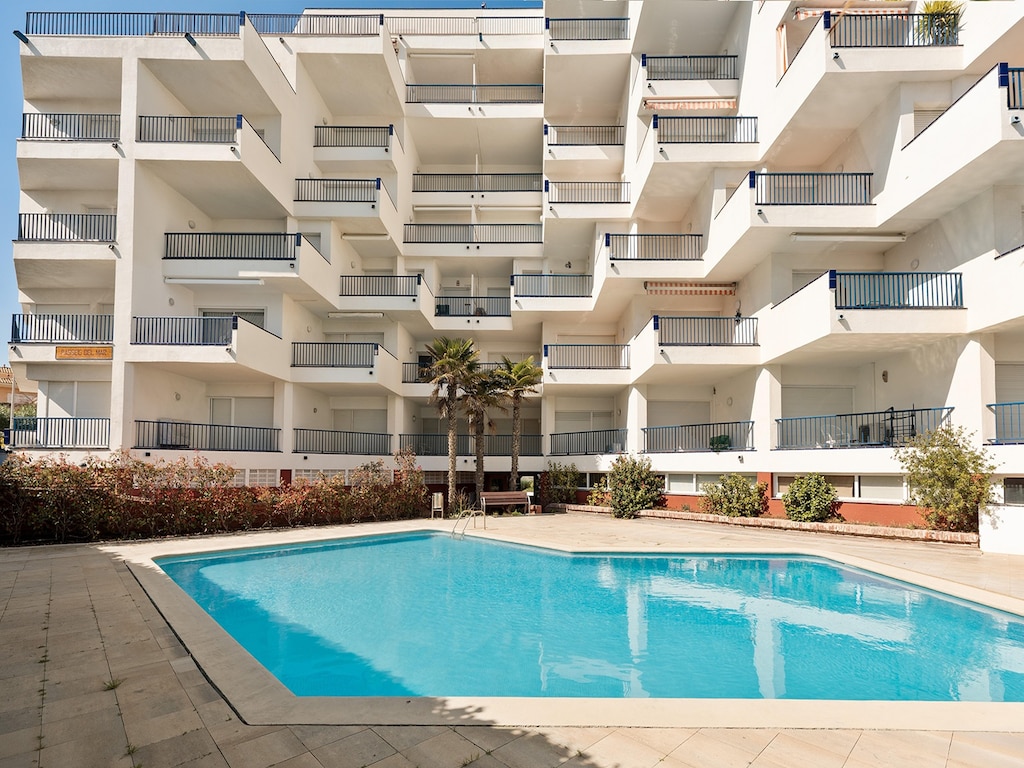 Duplex appartement met zwembad aan het strand van