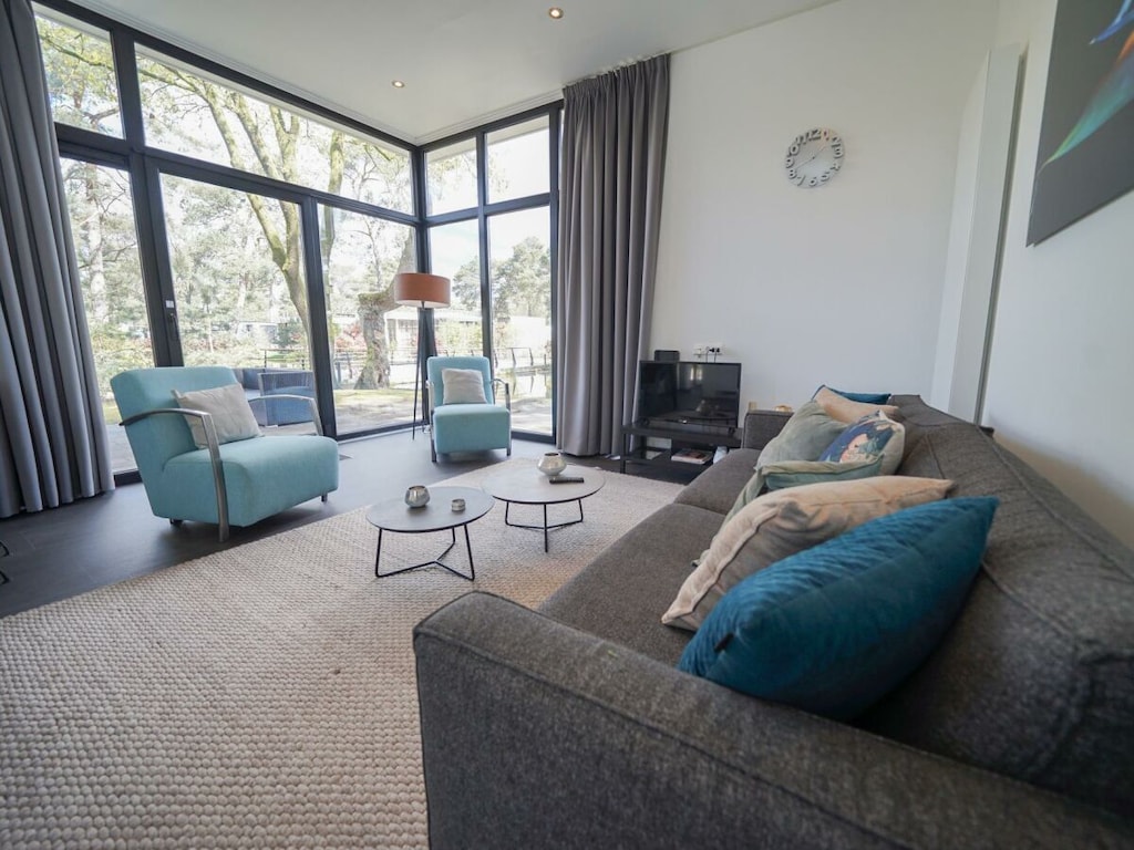 Modernes Ferienhaus in Otterlo für bis zu 4 Personen, mit 2 Schlafzimmern, möblierter Terrasse und kostenlosem WLAN.
