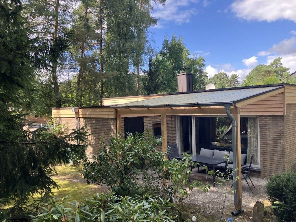 met tuin en open haard
