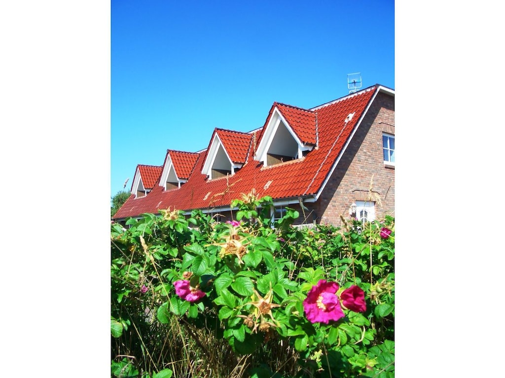Vakantieappartement in List met zwembad