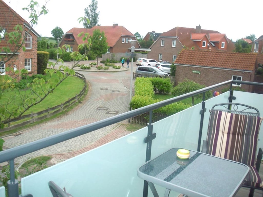 Appartement in Norddeich met zwembad