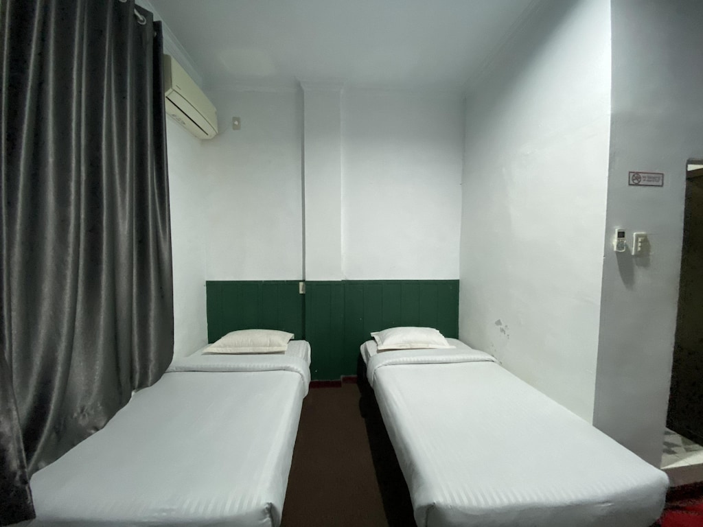 Quanza Hotel • Twin Heritage Zimmer