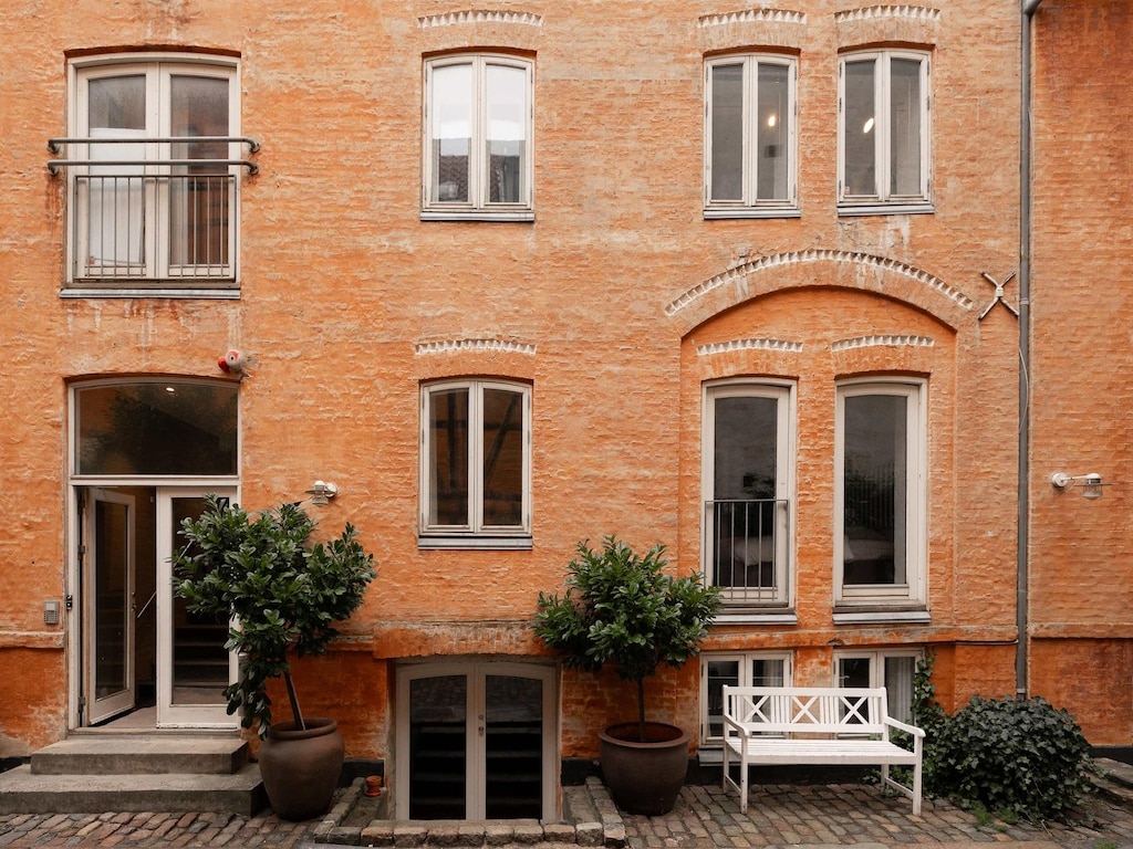 Appartement met toegang tot de binnenplaats