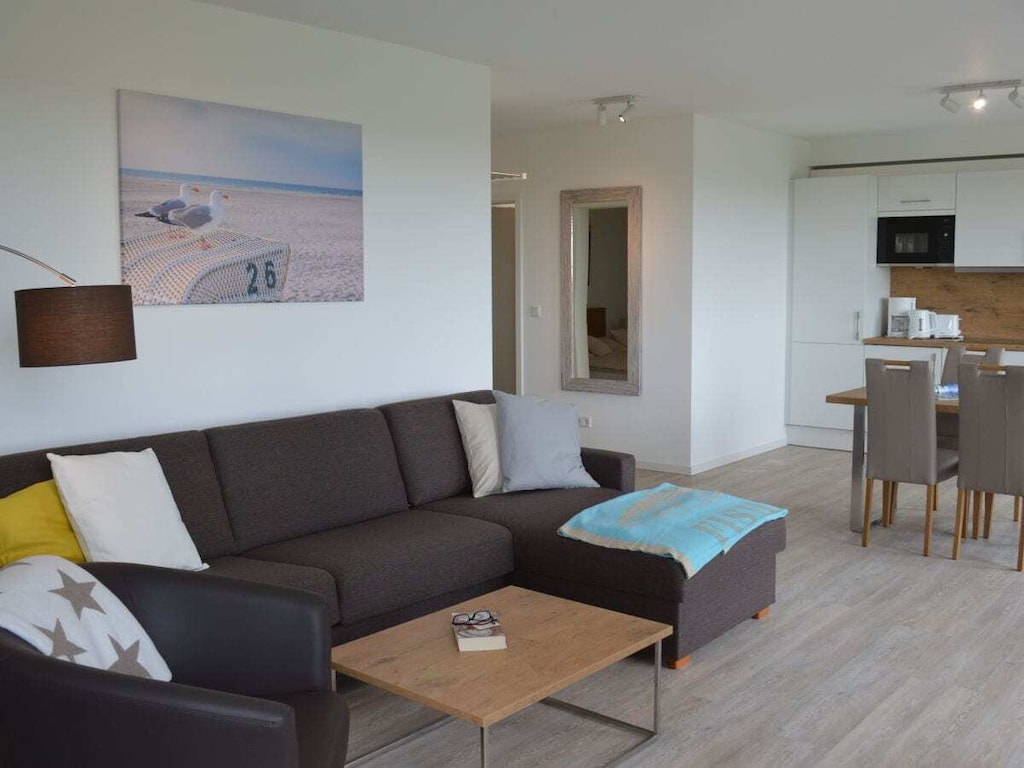 Nieuw gebouw met uitzicht op de Waddenzee en een balkon op het zuiden.