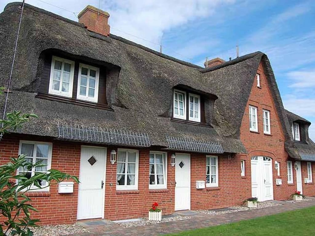 Vakantieappartement in List met zwembad