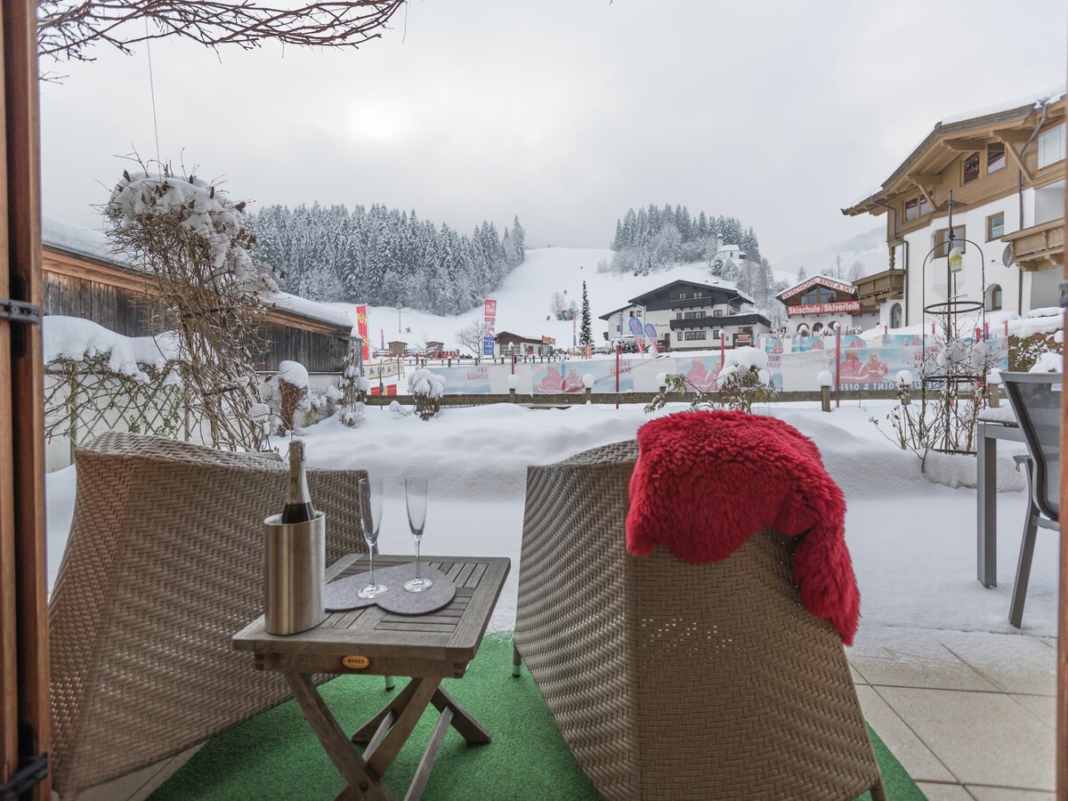 Centraal gelegen chalet in Ellmau direct aan de piste in Ellmau