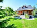 Holiday home with private land near the lake, Oswino