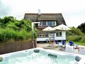Strohhaus auf Ameland mit Whirlpool und großem Garten