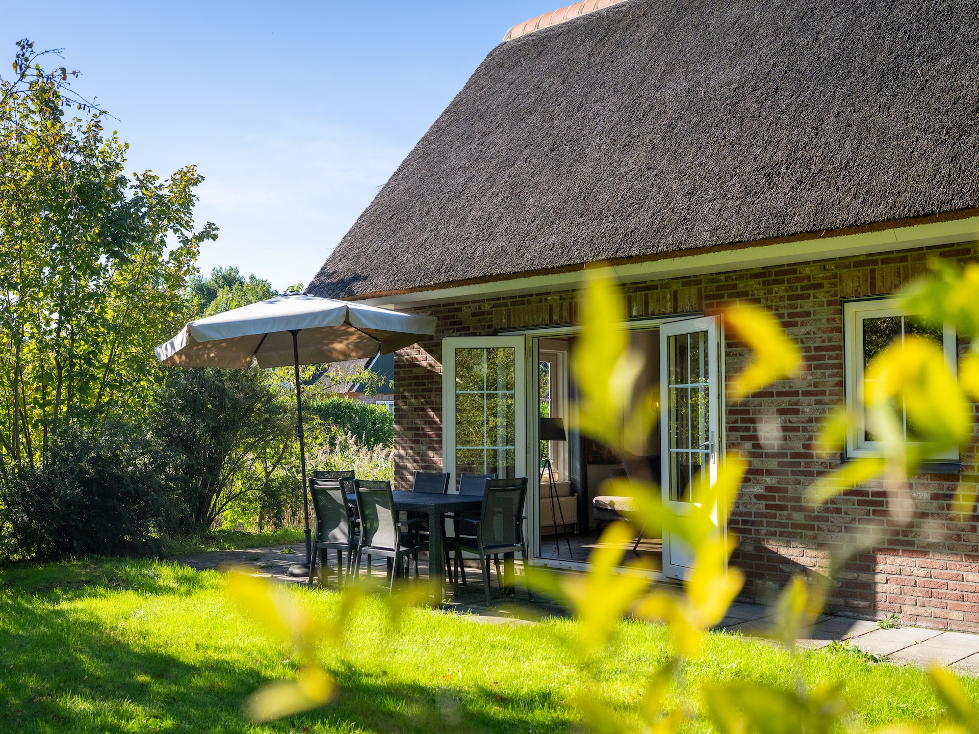 Vrijstaande rietgedekte villa met tuin in hartje Weerribben - foto 40