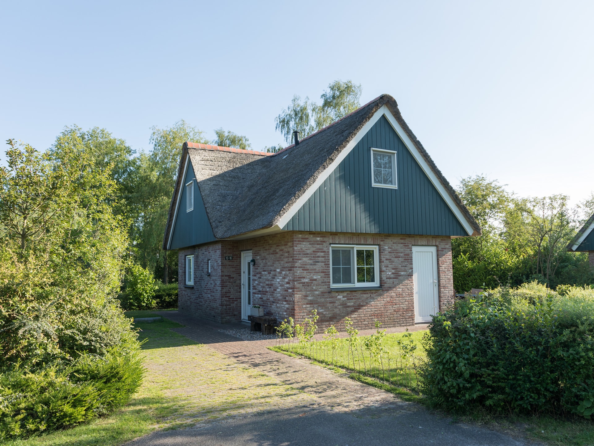 Rietgedekte 8-persoonsvilla in hartje Weerribben - foto 10