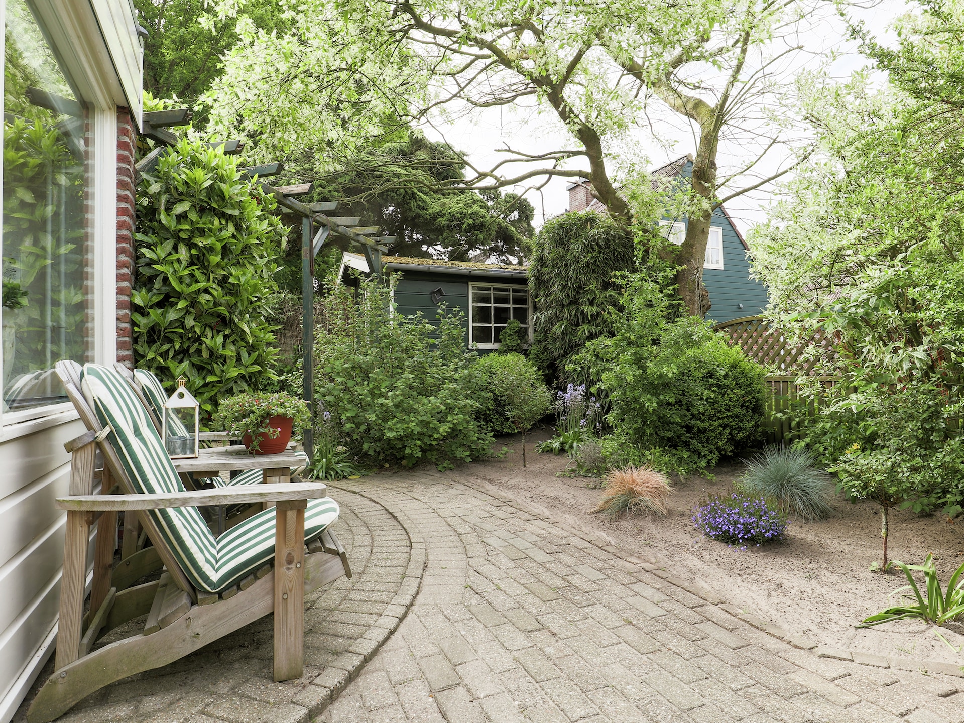Luxe vrijstaand vakantiehuis aan meer in Noordwijkerhout met tuin - foto 23