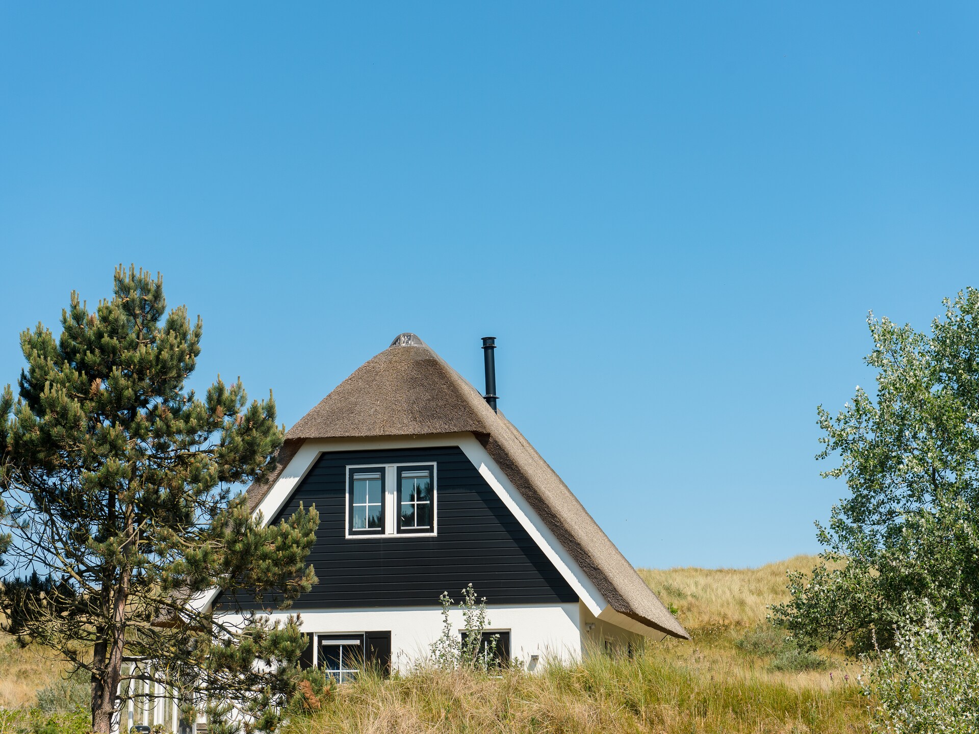 Vrijstaande rietgedekte villa voor 8 personen op Ameland, 100m van het strand - foto 10