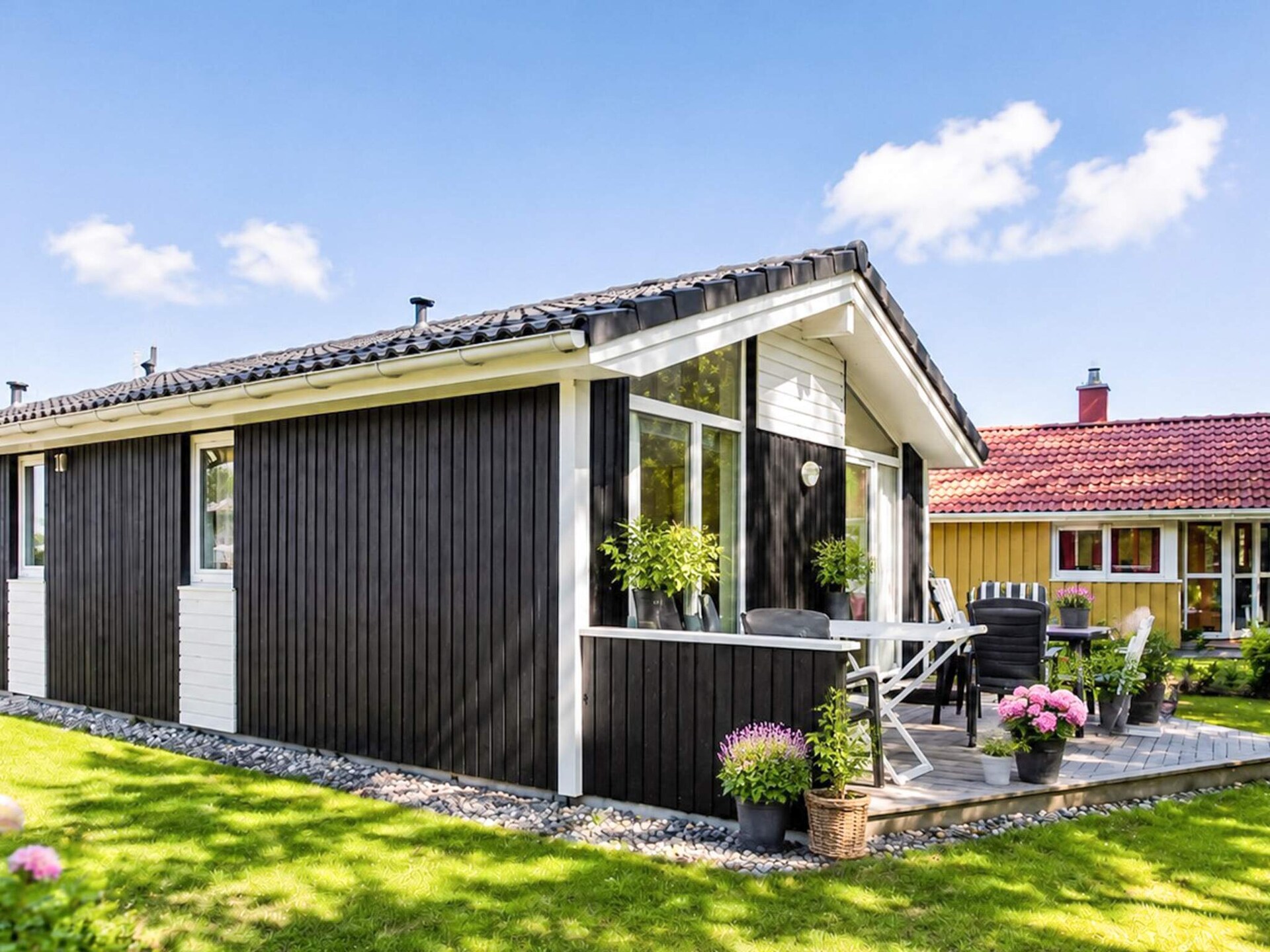 Aan zee: Licht vakantiehuis in Scandinavische stijl in Grömitz · 52 m² - foto 2