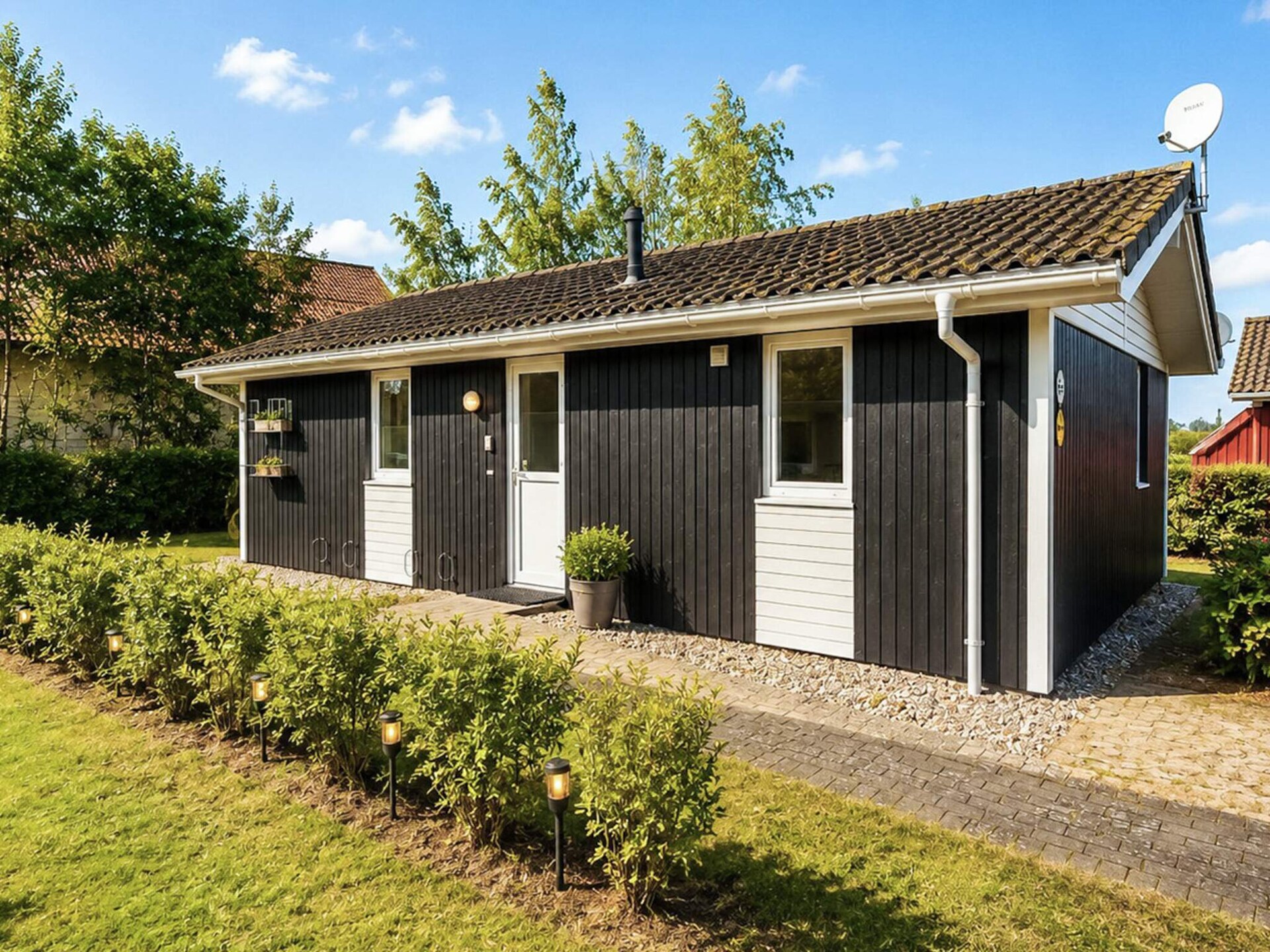 Aan zee: Licht vakantiehuis in Scandinavische stijl in Grömitz · 52 m² - foto 3