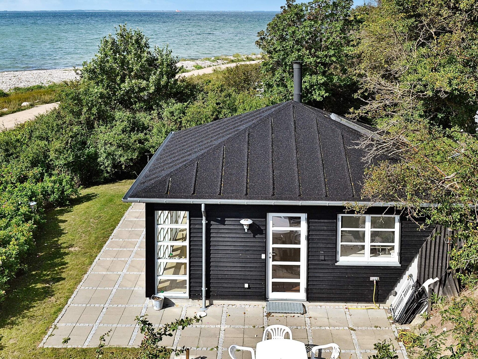 4-persoons vakantiehuis aan zee in Martofte met panoramisch uitzicht - foto 1