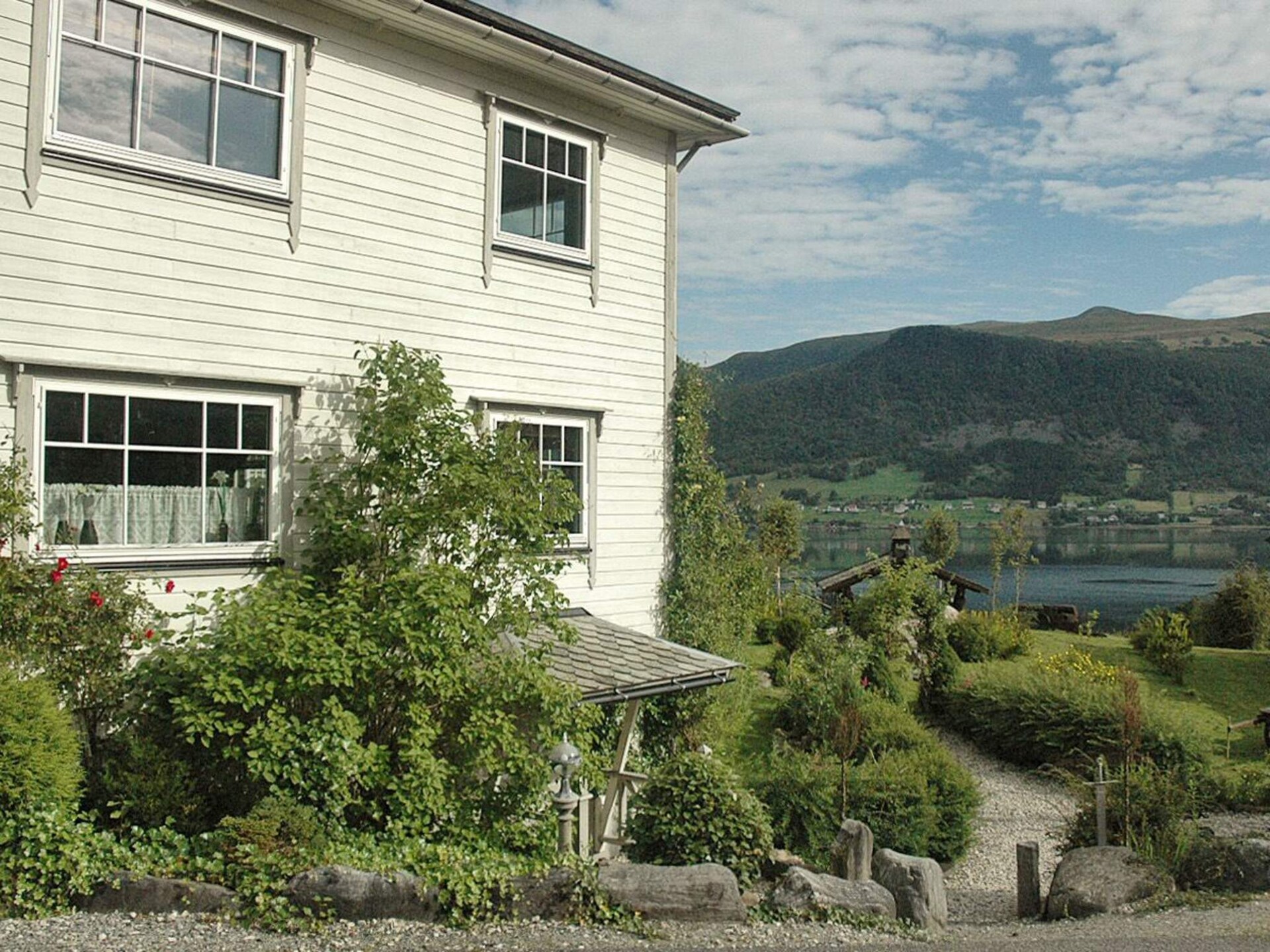 Panoramavakantiehuis aan de Syvdefjord met boothuur en berguitzicht - foto 23