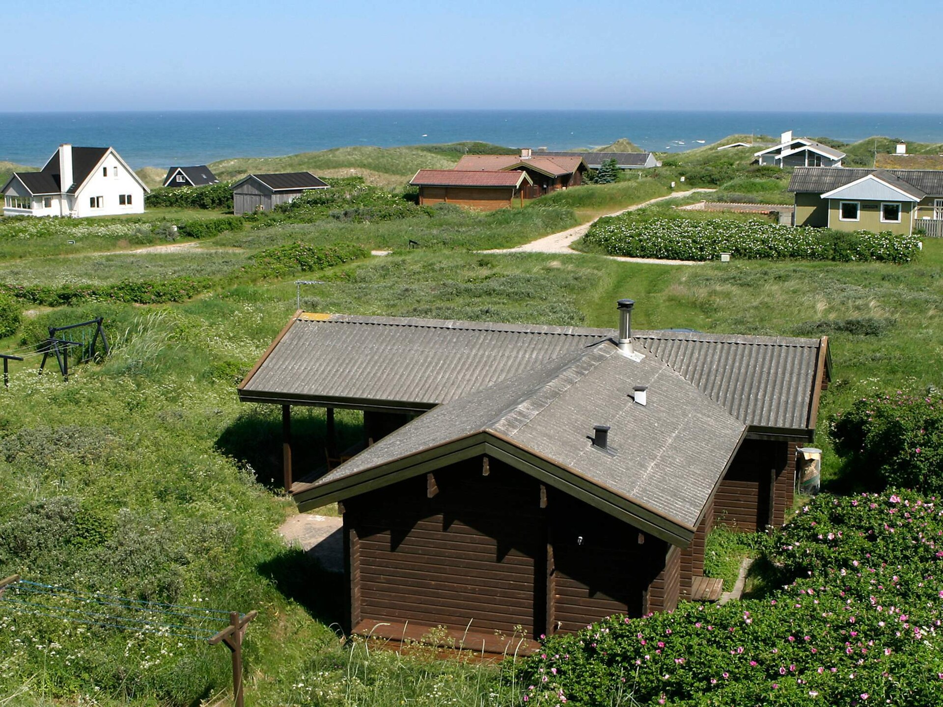Knus houten huis in de duinen bij Tornby Strand op 500 meter - foto 2