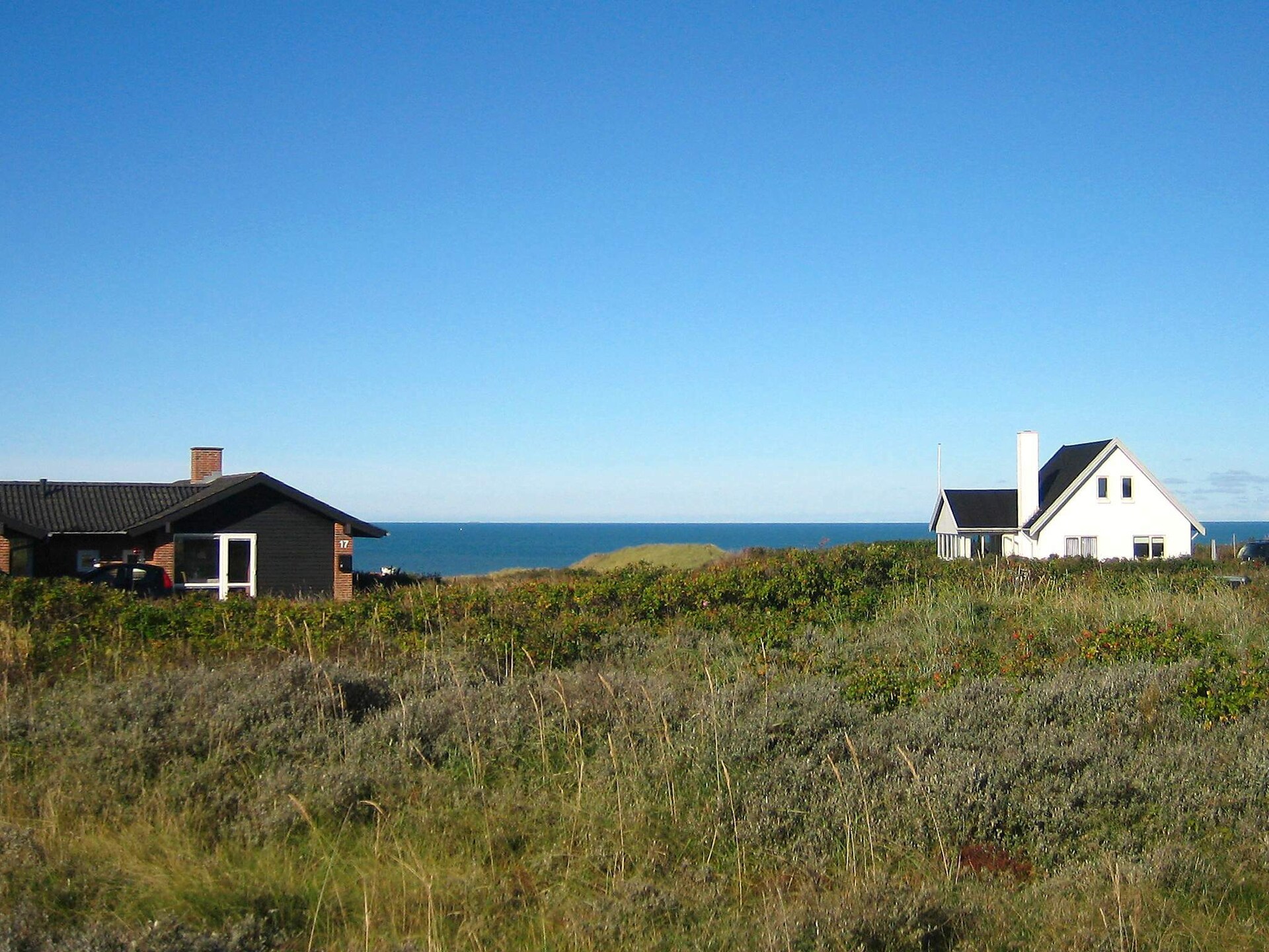 Knus houten huis in de duinen bij Tornby Strand op 500 meter - foto 10