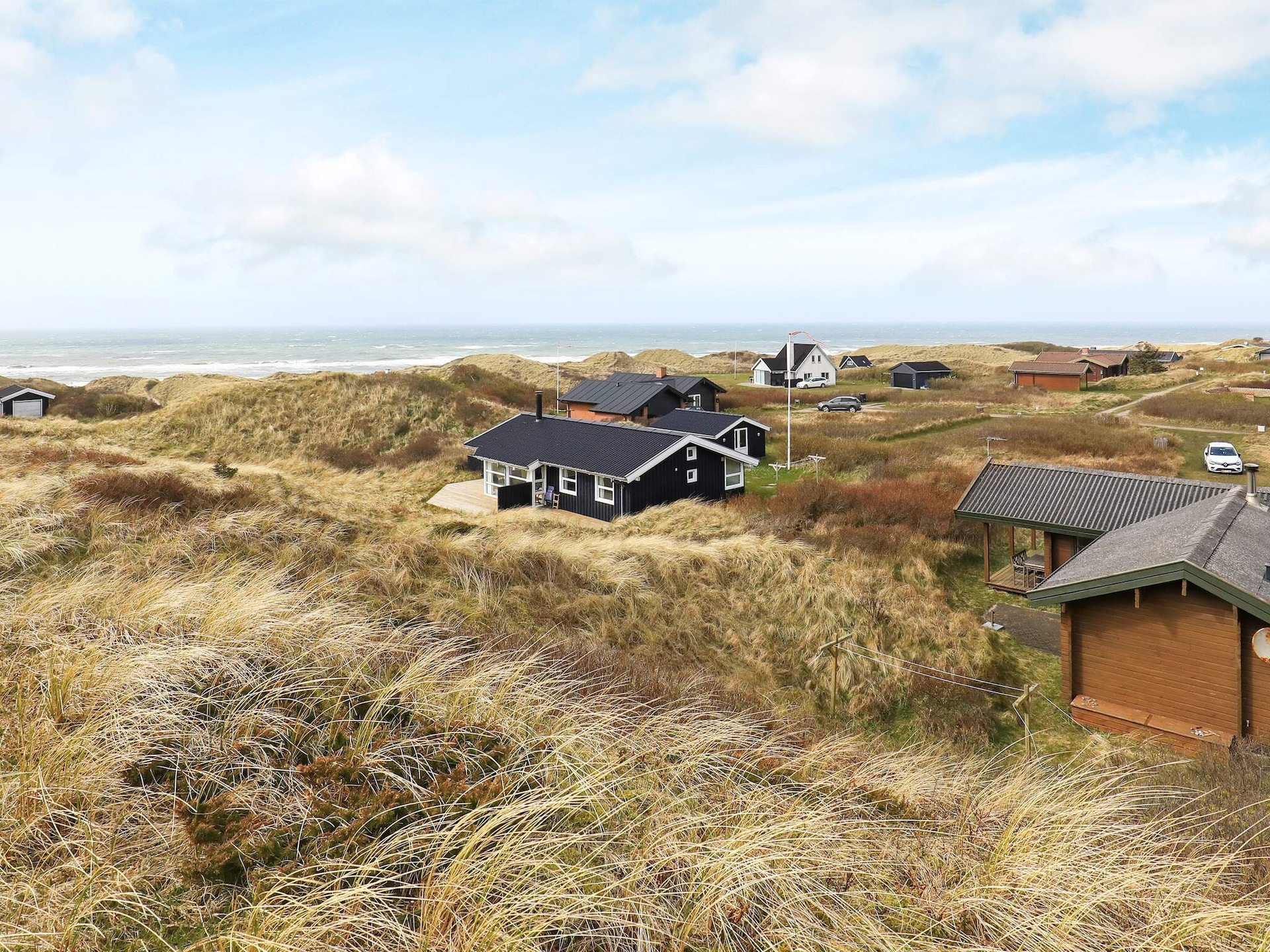 Knus houten huis in de duinen bij Tornby Strand op 500 meter - foto 9