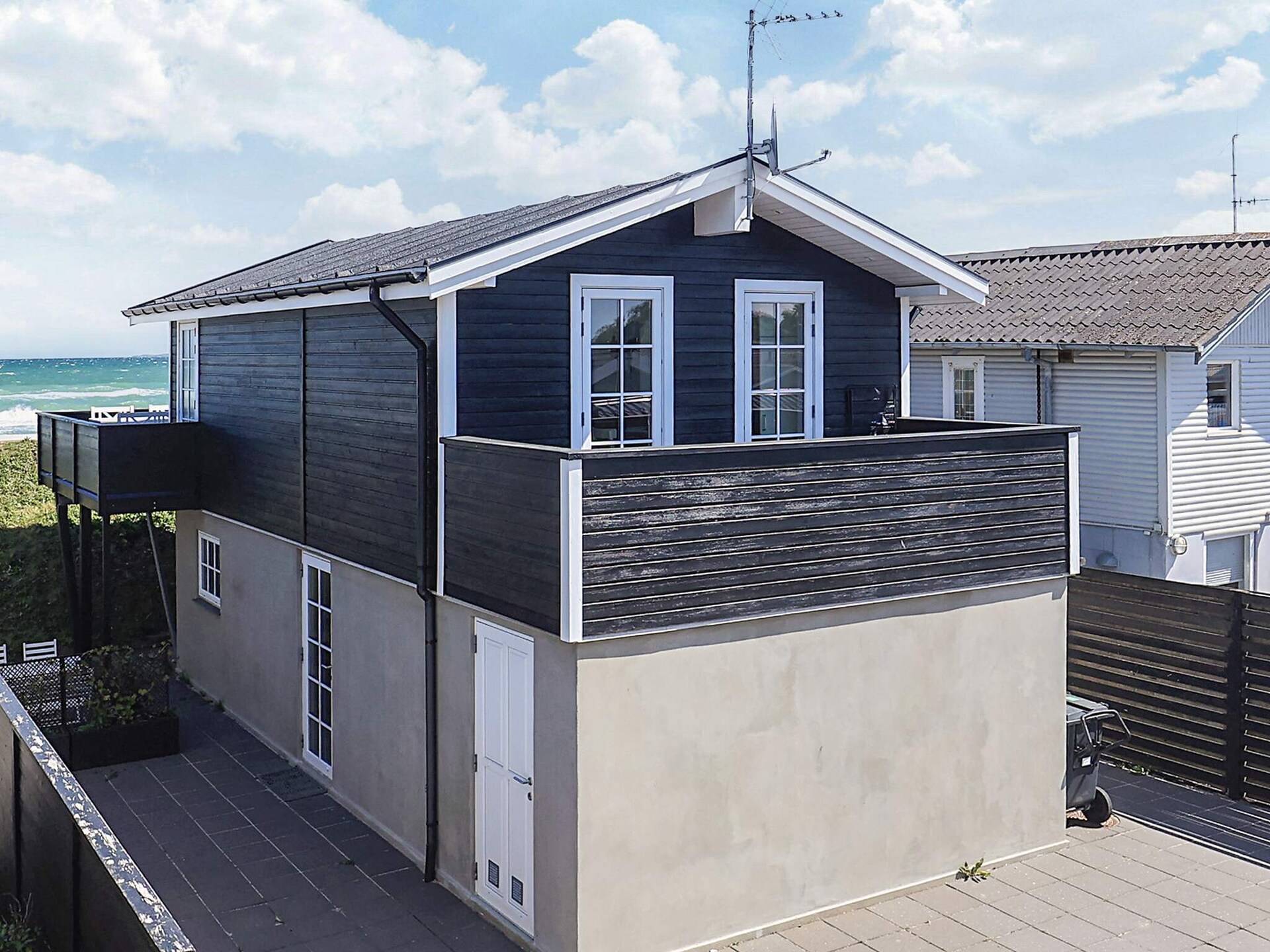 Vrijstaand vakantiehuis direct aan het strand van Hasmark met panoramisch waterzicht - foto 3