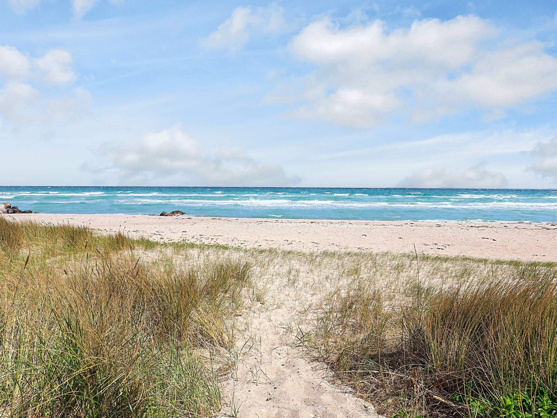 Vrijstaand vakantiehuis direct aan het strand van Hasmark met panoramisch waterzicht - foto 12