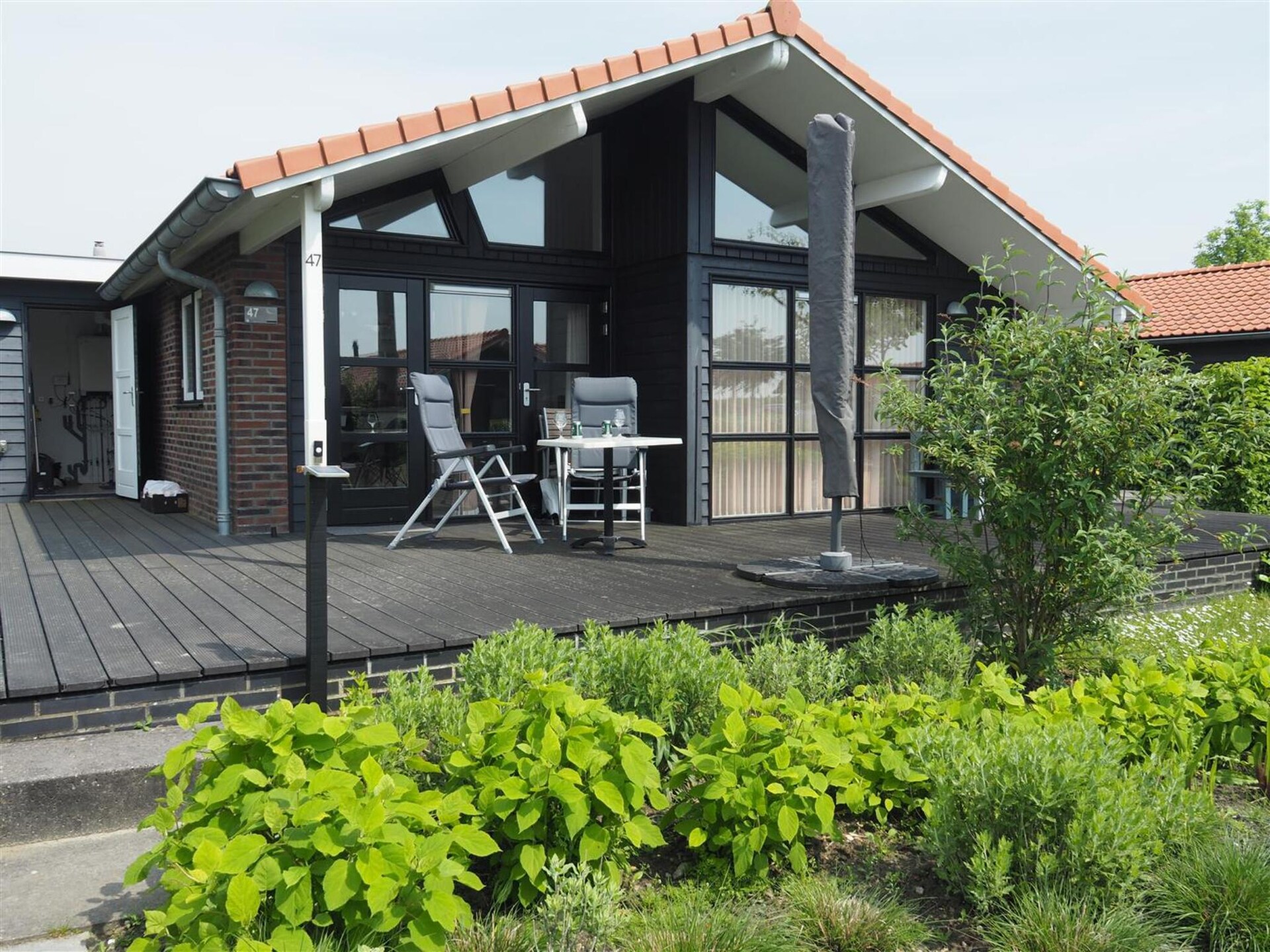 Modern vakantiehuis aan de Goese Golf met tuin en zwembad - foto 10