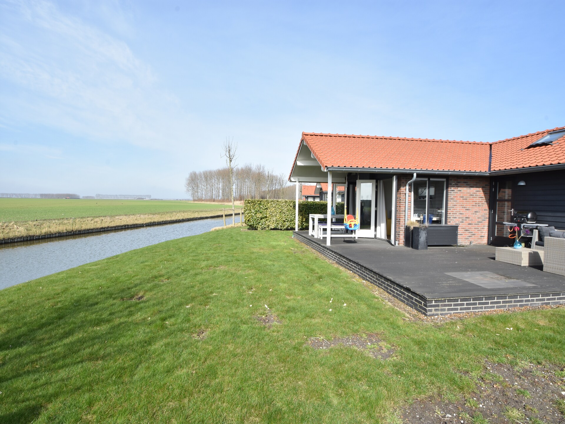 Weidse Blik: Vrijstaand chalet met tuin aan de Oosterschelde - foto 11