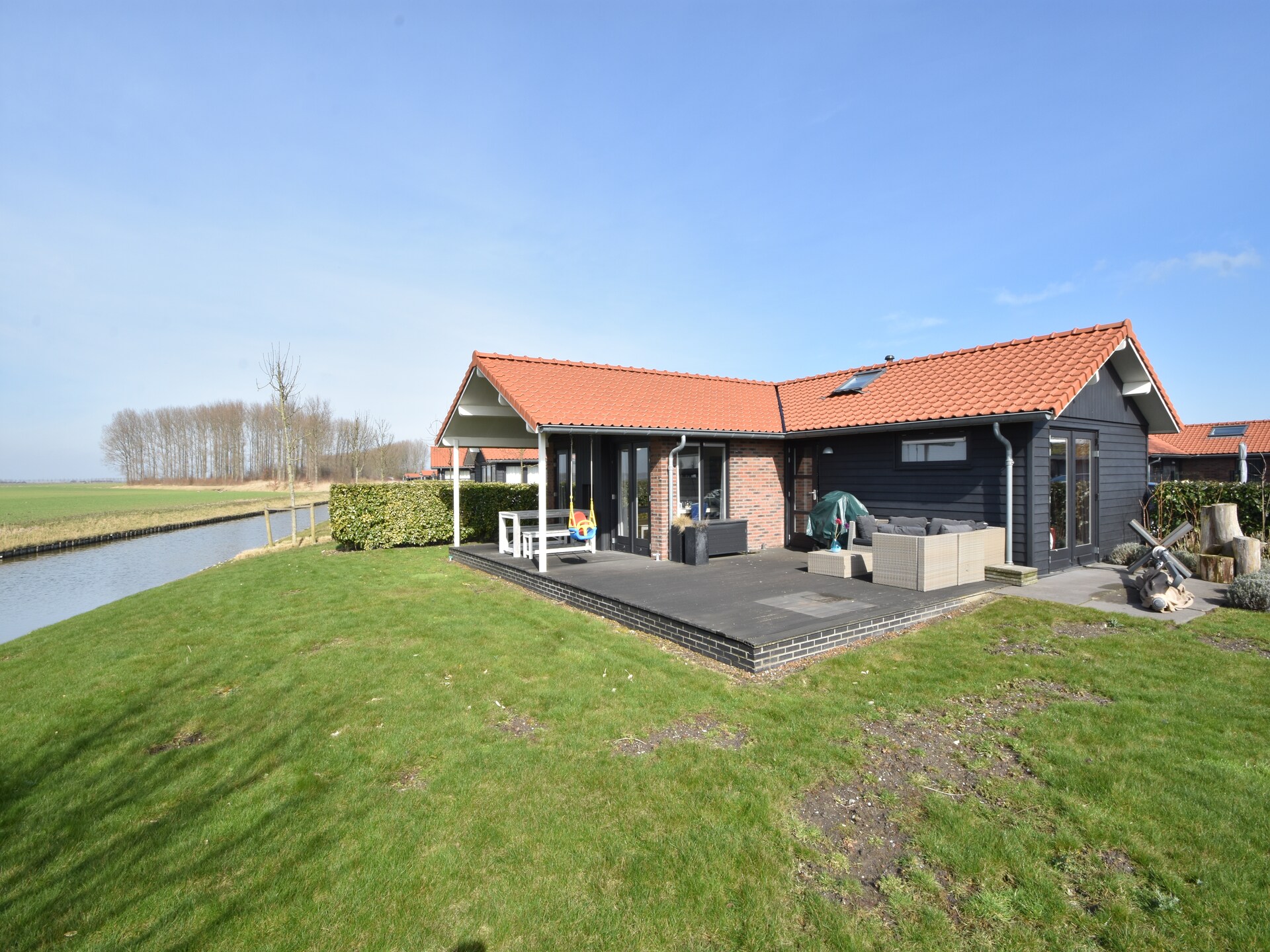 Weidse Blik: Vrijstaand chalet met tuin aan de Oosterschelde - foto 25