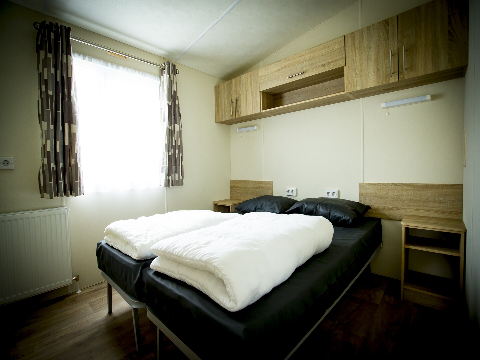 Knusse Delta Lodge op Recreatiepark Duinhoeve in Udenhout - foto 2