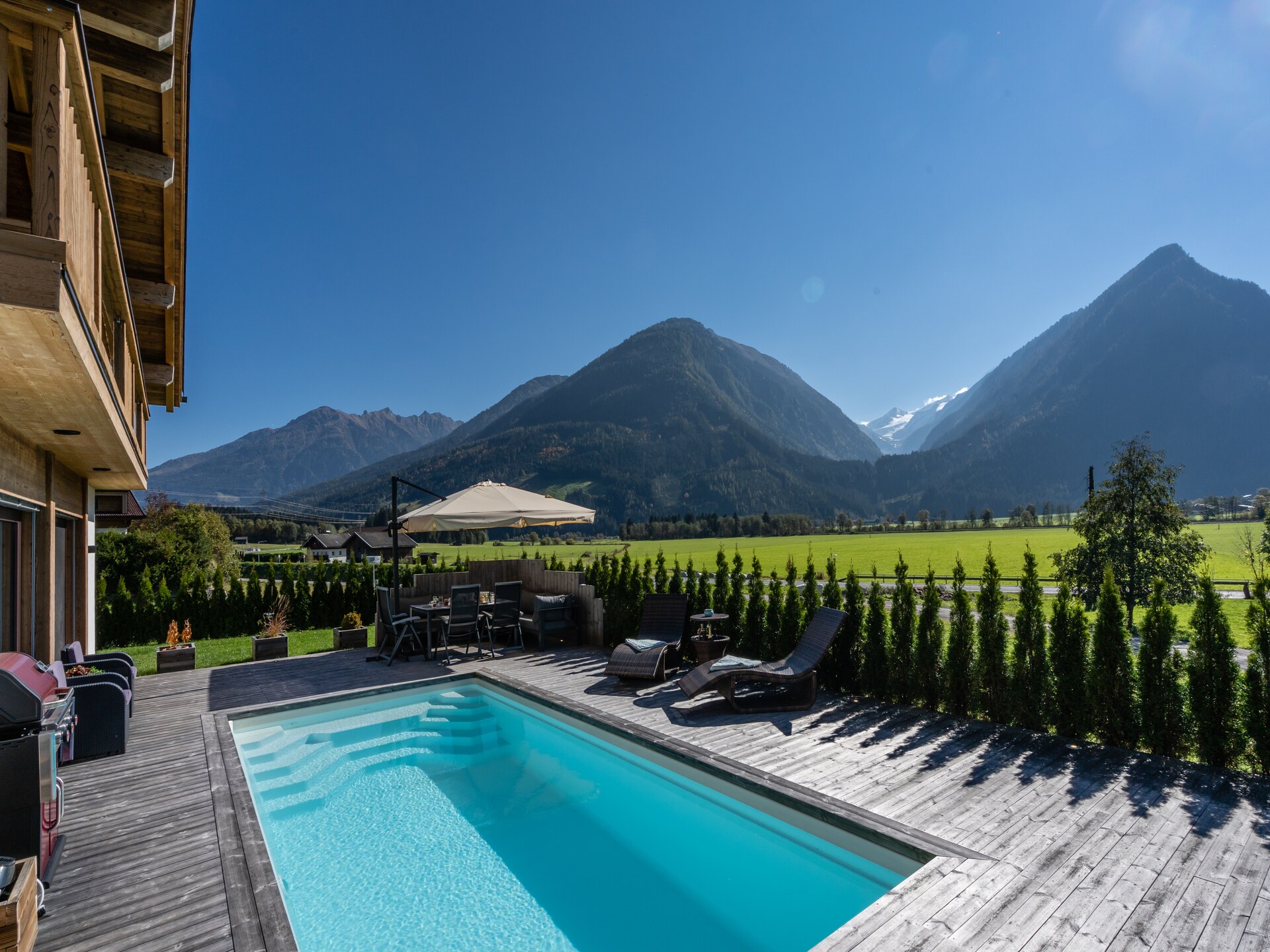 Op 300 m van de piste: Luxe chalet met privézwembad in Neukirchen - foto 2